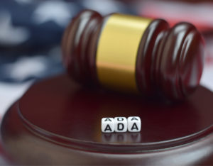 Gavel with block letters A D A